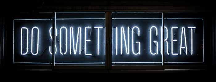 You're B2B marketing plan is done. This neon sign reads "Do Something Great"
